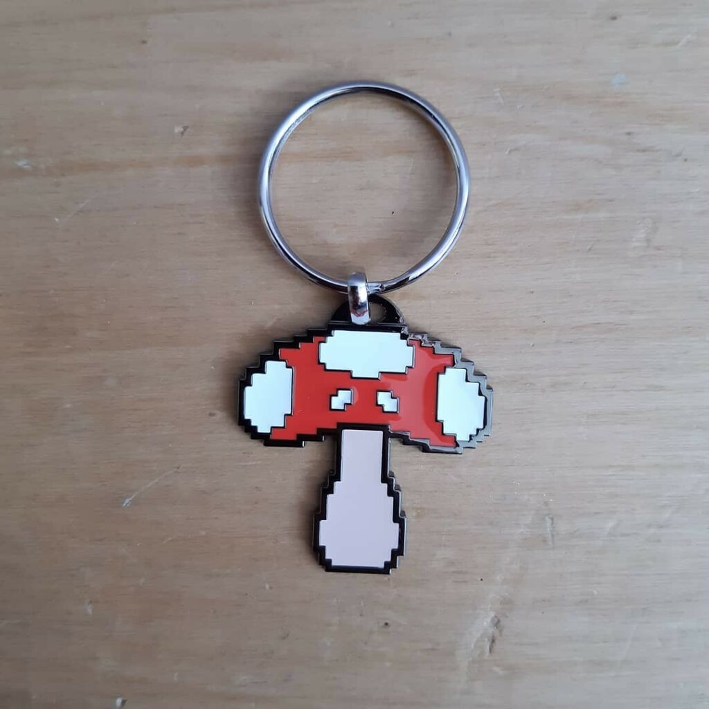 Porte-clé Médaillon Champignon Pixel - Game Explorers